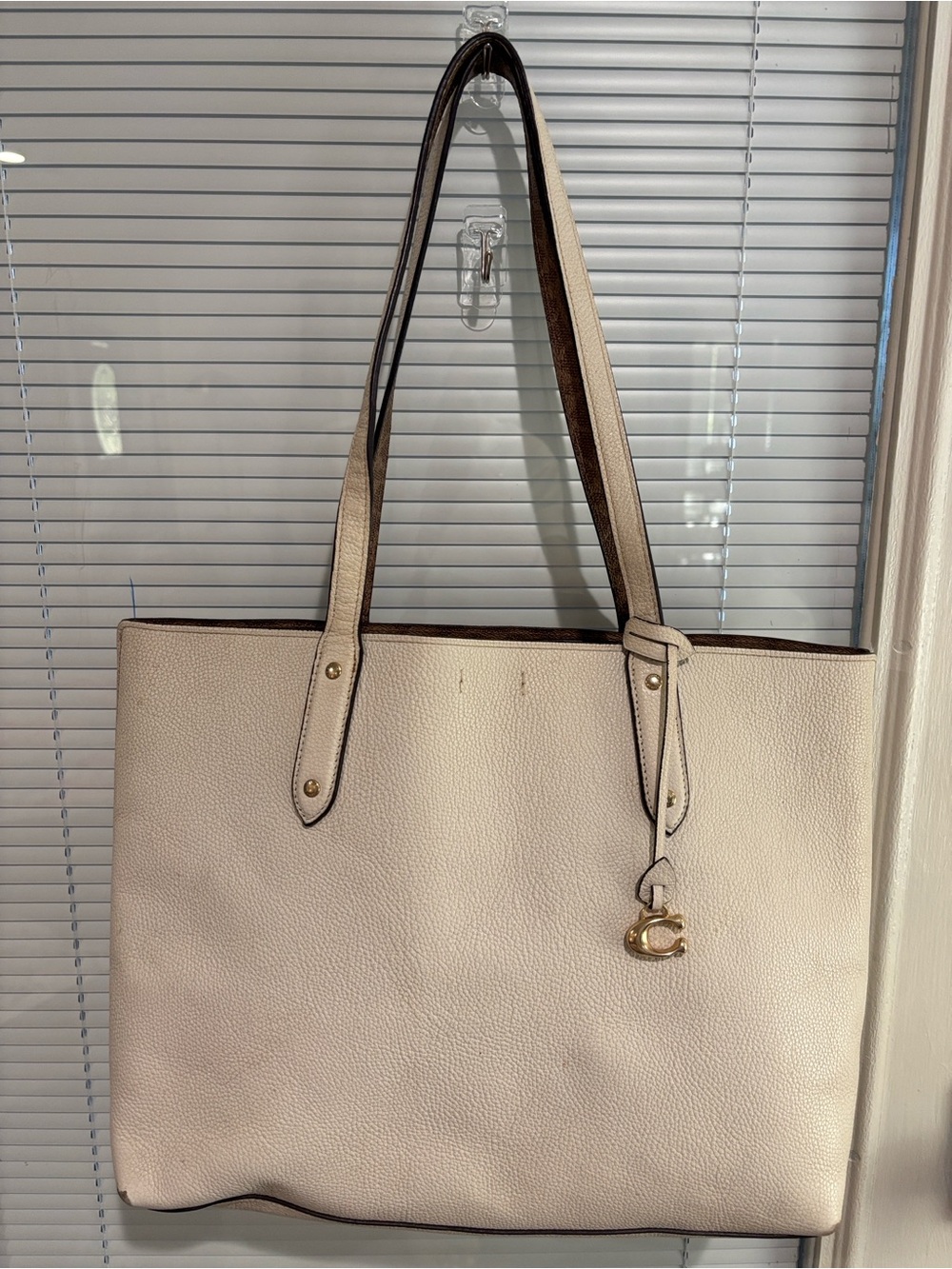 Coach Cream Leather Tote with Gold Charm